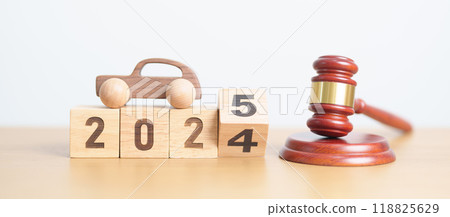 2024 end year to Happy New Year 2025 with small toy car models and Judges gavel on desk in courthouse. Car Law, Insurance, auto Tax, Auction and Bidding concepts 2024 end year to Happy New Year 2025 with small toy car models and Judges gavel on desk in courthouse. Car Law, Insurance, auto Tax, Auction and Bidding concepts 118825629