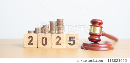 Happy New Year 2025 with judge gavel and money coins stack on desk. Law cost, lawyer, judgment, justice auction and bidding concepts 118825633