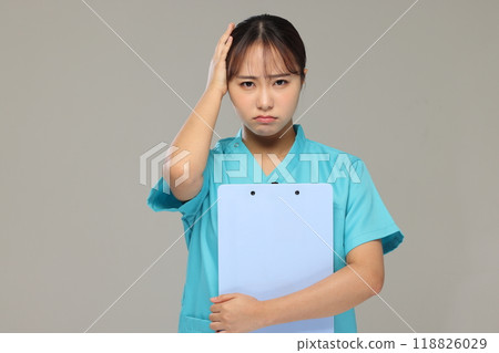 Worried nurse negative Worried nurse negative 118826029