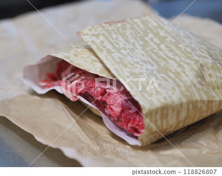 Wagyu beef purchased from a butcher (uncooked, cut into strips) Wagyu beef purchased from a butcher (uncooked, cut into strips) 118826807