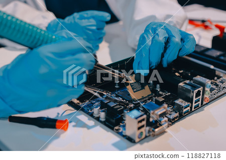 Electronics technician, electronic engineering electronic repair, electronics measuring and testing, repair and maintenance concepts. Electronics technician, electronic engineering electronic repair, electronics measuring and testing, repair and maintenance concepts. 118827118