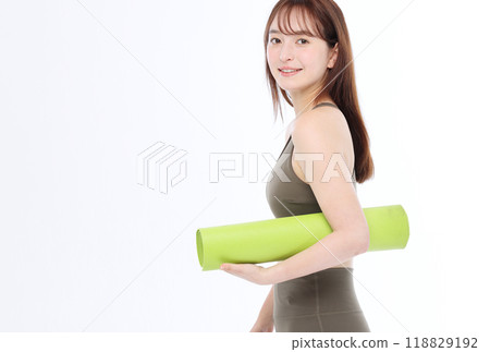 woman with yoga mat woman with yoga mat 118829192