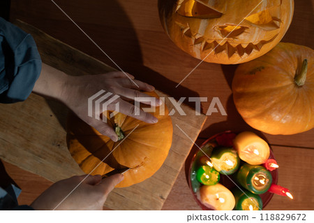 Engaging in Festive Pumpkin Carving and Exciting Halloween Preparation Activities is Fun Engaging in Festive Pumpkin Carving and Exciting Halloween Preparation Activities is Fun 118829672