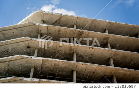 A new modern multi-storey residential building under construction A new modern multi-storey residential building under construction 118830697