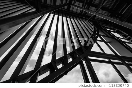 A structure featuring wooden slats on construction site contributing to its architectural style A structure featuring wooden slats on construction site contributing to its architectural style 118830740