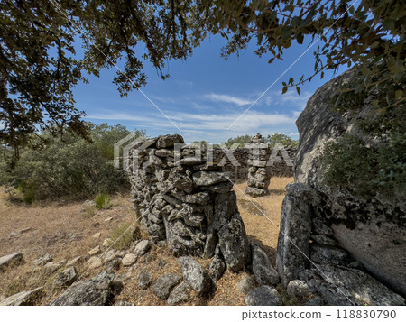 Ancient Stone Corral Amidst Mediterranean Landscape 118830790