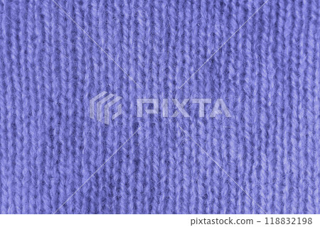 Trendy Color of Year Very peri. texture of knitted angora fabric. Violet wool texture. Knitted jersey background with relief pattern for wallpaper and abstract background. Wool hand- machine, handmade Trendy Color of Year Very peri. texture of knitted angora fabric. Violet wool texture. Knitted jersey background with relief pattern for wallpaper and abstract background. Wool hand- machine, handmade 118832198
