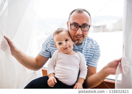 Portrait of father with little son. 118832821