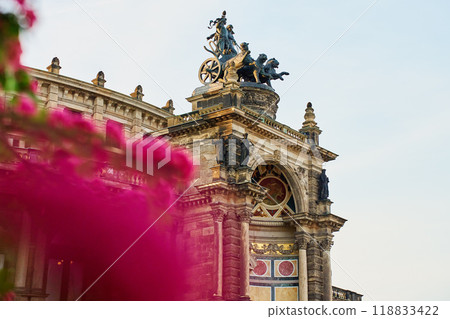 Detailed view of Semperoper Opera house facade in Dresden with architectural details and chariot sculpture on top. Germany architecture with historical building 118833422