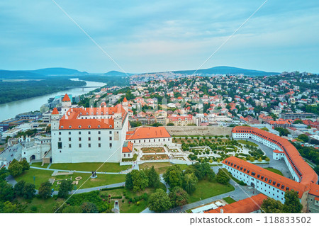Panorama of Bratislava, Slovakia. Aerial view of historic European city with vibrant red rooftops. Urban landscape with historical buildings 118833502