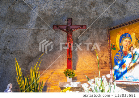 Wooden cross crucifixion with Jesus Christ God in Catholic Cathedral 118833681