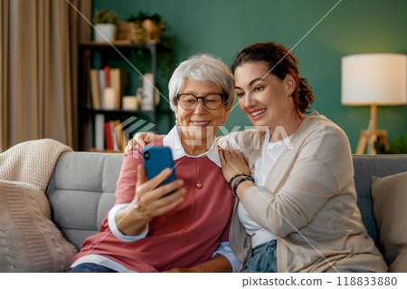 Young and senior women are using smartphone 118833880