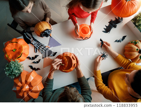 Happy family preparing for Halloween. Happy family preparing for Halloween. 118833955