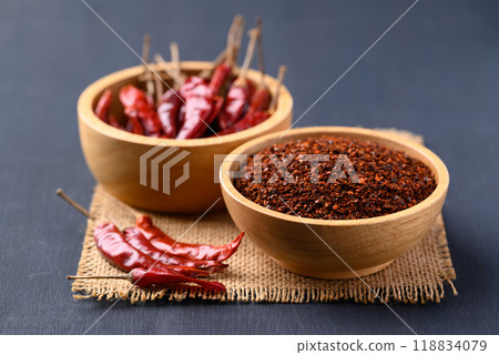 Red chili powder in bowl on black background, Food ingredient Red chili powder in bowl on black background, Food ingredient 118834079