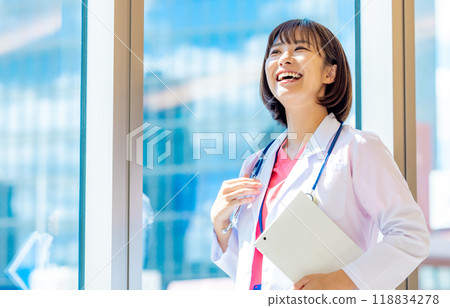 Woman in a white coat. Photo courtesy of Denpa Gakuen, Tokyo Electronics College. 118834278