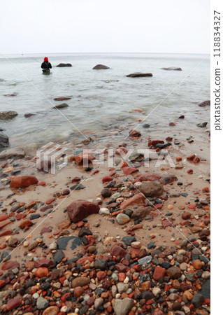 Fisherman Stones in sea water autumn Fisherman Stones in sea water autumn 118834327