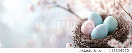 A beautiful nest with pastel-colored eggs surrounded by blooming flowers in spring 118834970