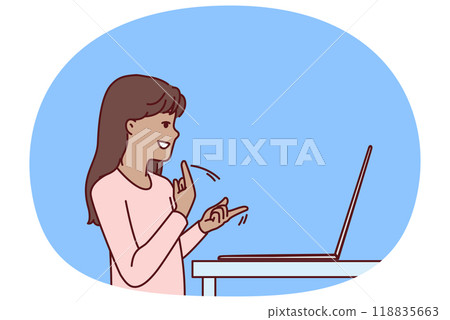 Silent teenage girl using laptop and sign language making video call to friends or school teacher 118835663