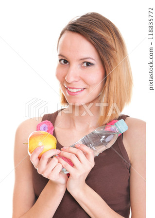 Beautiful girl drinking water from blue bottle isolated Beautiful girl drinking water from blue bottle isolated 118835772