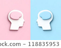 Profile image of man and woman facing each other and silhouette of brain 118835953