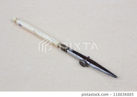 Vintage retro ruling pen on paper 118836885