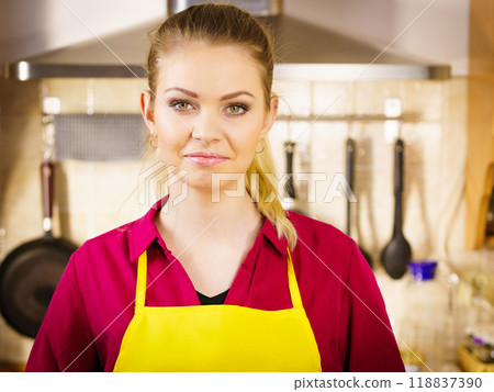 Young woman wearing apron Young woman wearing apron 118837390
