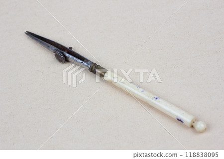 Vintage retro ruling pen on paper 118838095