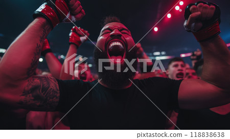 Emotional man, fan, fists raised and roaring in excitement, captures the energy of the crowd. 118838638