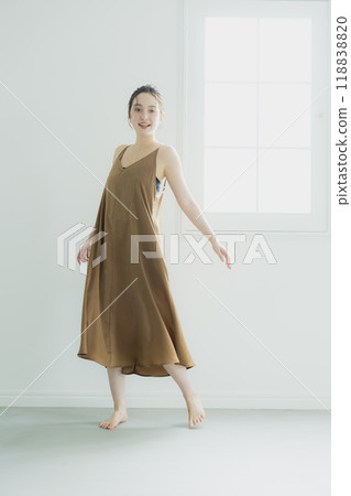 Young woman wearing a dress 118838820
