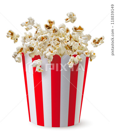 Popcorn flying out of a box close-up on a white. Isolated 118839149