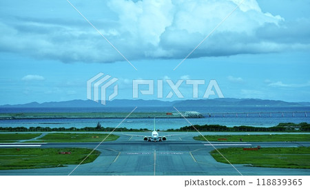 An airplane running on the runway at Naha Airport in Okinawa Prefecture An airplane running on the runway at Naha Airport in Okinawa Prefecture 118839365