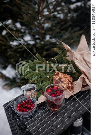 Fresh cranberry tea outdoors winter time 118840037
