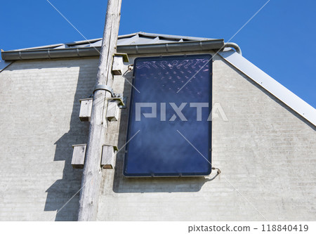 Solar panel on the wall of the house 118840419