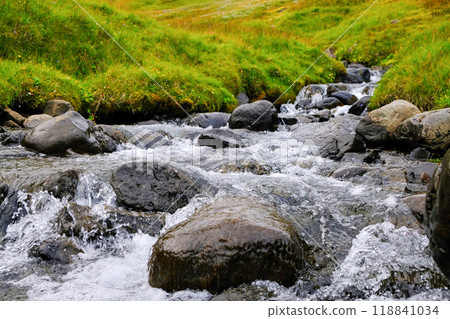 Close-up of flowing water in a mountain river. 118841034