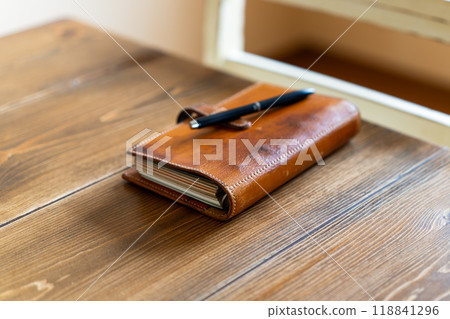 System notebook and pen 118841296