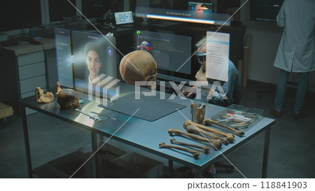 Archaeologist in VR headset studies fossil skull using virtual display with AI assistant 118841903