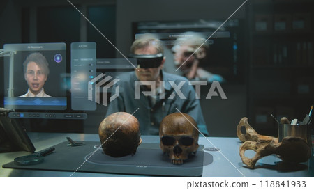 Archaeologist in VR headset using virtual display with AI assistant and web browser Archaeologist in VR headset using virtual display with AI assistant and web browser 118841933