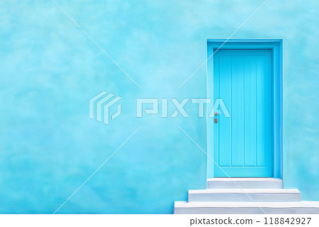 Bright blue door against a vibrant turquoise wall 118842927