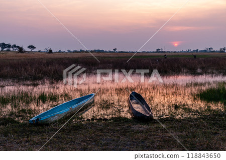Sunset in the Okavango Delta Sunset in the Okavango Delta 118843650