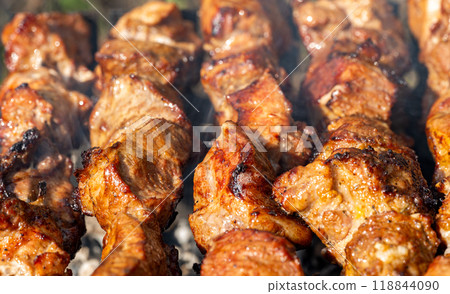 meat being grilled meat being grilled 118844090