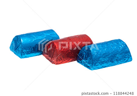 chocolate candies in foil isolated chocolate candies in foil isolated 118844248