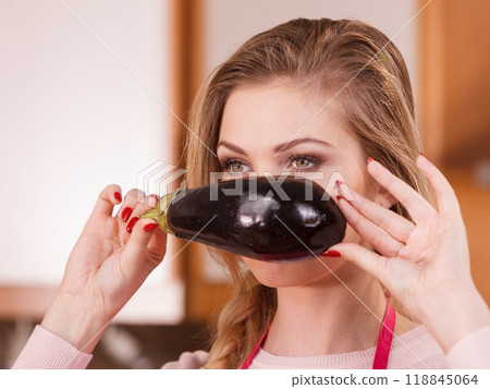 Woman holding eggplant Woman holding eggplant 118845064