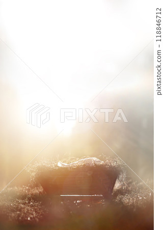 A bright light shines in the manger blessing the baby Jesus, the birth background of Jesus commemorating Christmas and Christmas 118846712