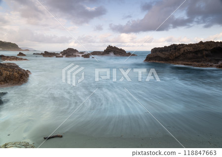 Tranquil Twilight Tide: Rocky Cove at Sunset. Toucheng, Yilan, Taiwan. 118847663