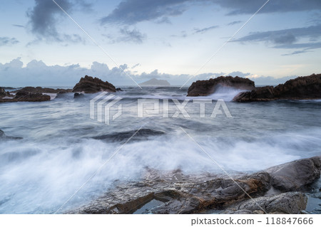 Tranquil Twilight Tide: Rocky Cove at Sunset. Toucheng, Yilan, Taiwan. Tranquil Twilight Tide: Rocky Cove at Sunset. Toucheng, Yilan, Taiwan. 118847666