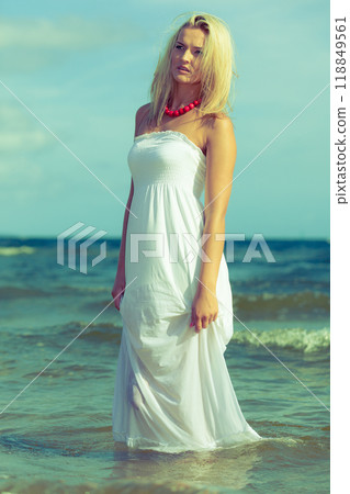 Young woman chilling out on the beach. 118849561