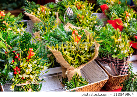 Mistletoe bouquets in sale on Christmas market Mistletoe bouquets in sale on Christmas market 118849964