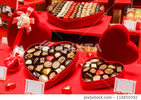 Heart shaped boxes of chocolate candies. Valentine Day concept Heart shaped boxes of chocolate candies. Valentine Day concept 118850392