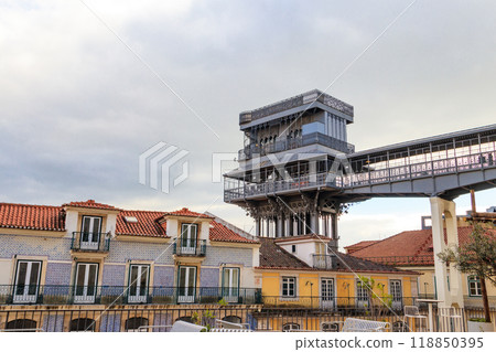 Santa Justa lift in Lisbon, Portugal. Famous landmark and entertaining tourist attraction with viewing platform upstairs 118850395