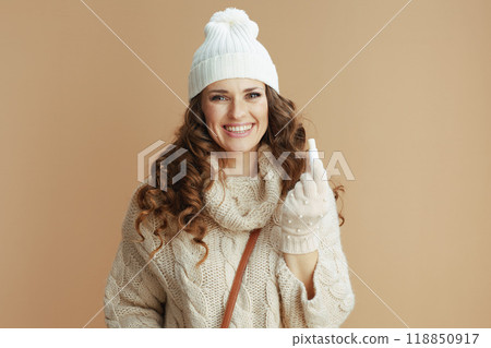 happy elegant woman isolated on beige background 118850917